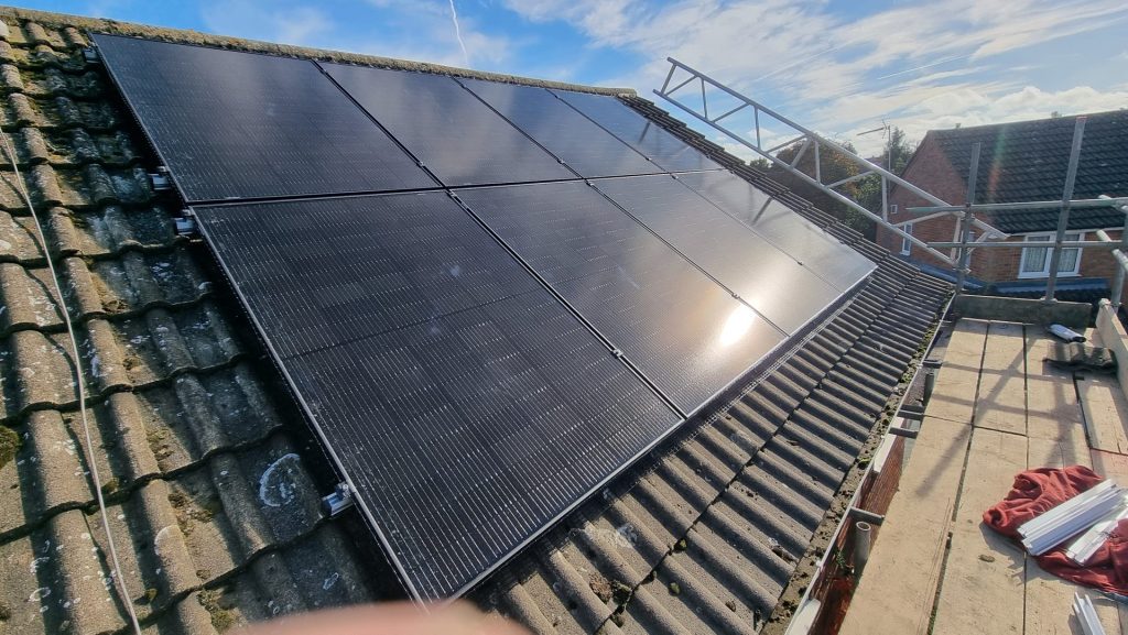 Electrician repairing circuit breaker panel