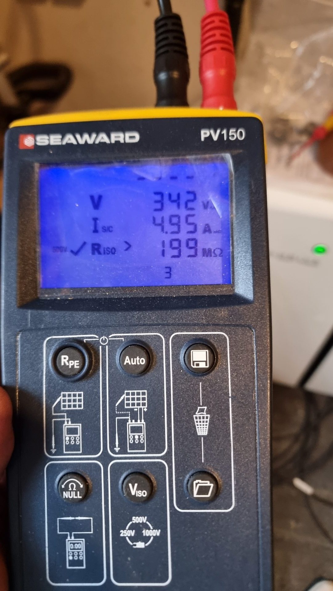 Electrician testing residential fuse board