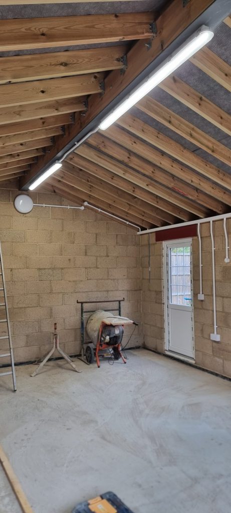 Electrical technician checking power supply