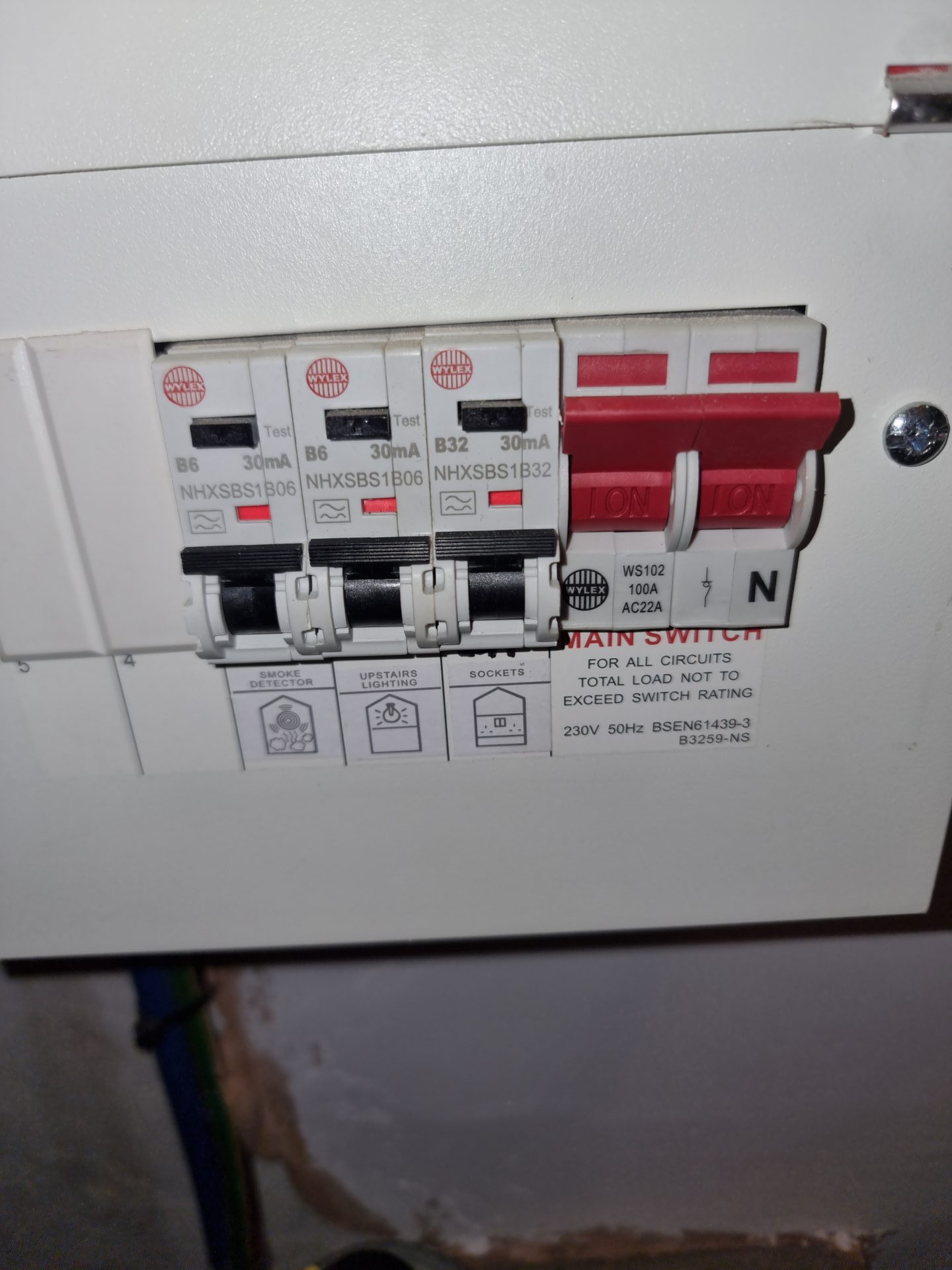 Electrician installing modern lighting system