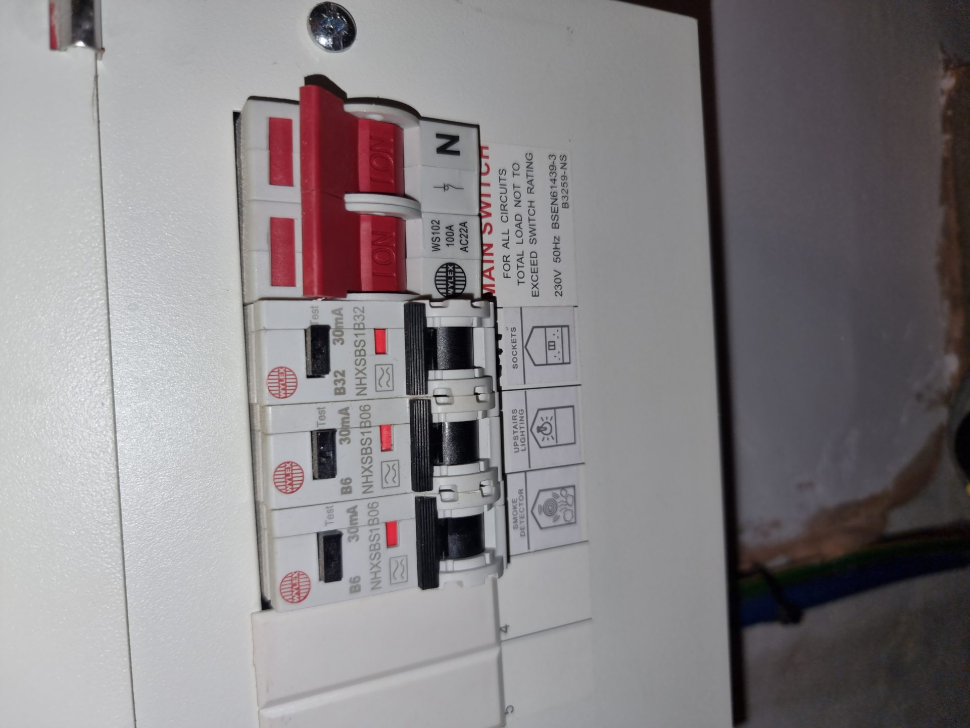 Electrician installing modern lighting system