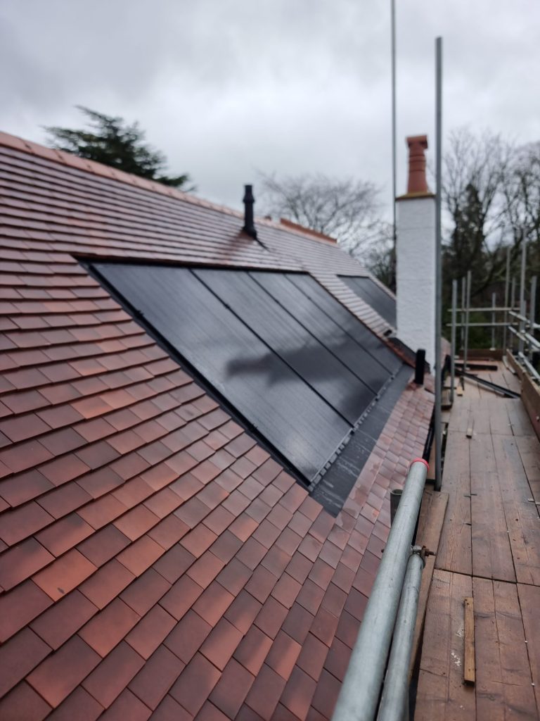 Electrician working on control board
